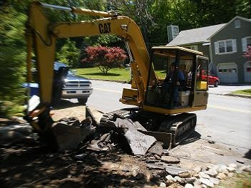 Spino's Paving excavator at work